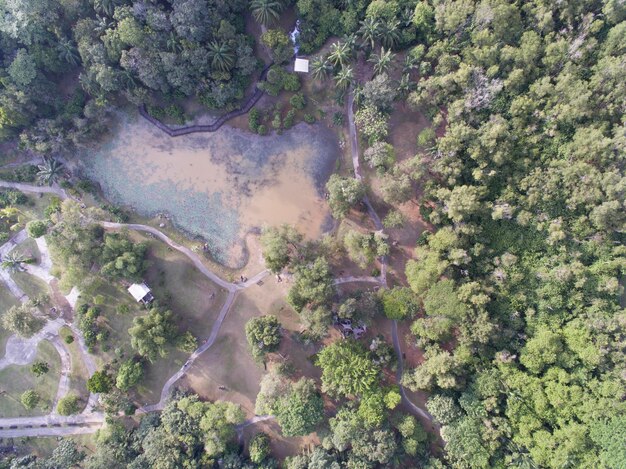 An aerial view of an animal shelter situated near a river, highlighting its vulnerability to flooding. The image includes clear markers indicating potential flood zones.
